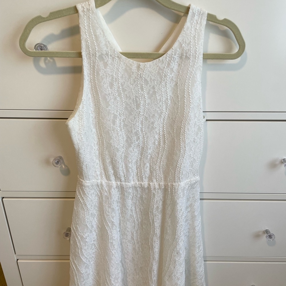 MM Couture Size White short dress with open back. Size Small